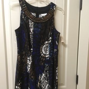 Brand new boho-patterned dress, beaded neck